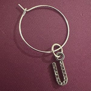 Wine glass charm with Swarovski crystals on initial “U”